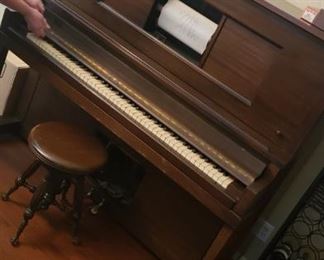 refurbished 1908 player piano with many music scrolls. Plays well!