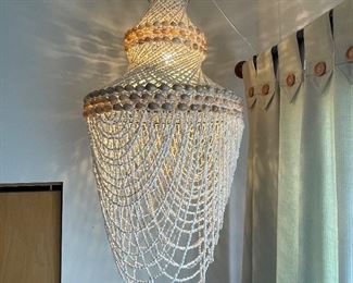 Additional view of Shell hanging light when lit, 32"H,  $40