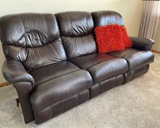 Pair of brown leather manual reclining sofas, 88"W x 36"D x 38"H, was $350, NOW $250