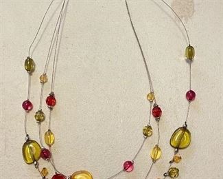 Yellow, red, green beaded 3 string necklace,  $8