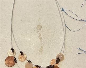 2 string copper & silver disc necklace, $8