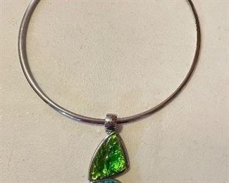 Silver necklace w/ green and blue pendant, $10