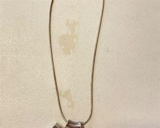 Silver chain with clear pendant, $10