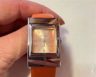 Terner orange cuff watch, $10