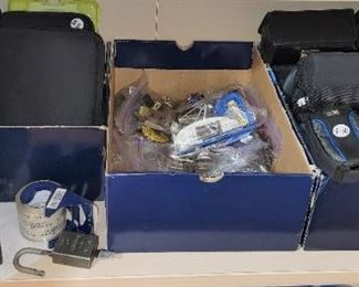 Camera cases, pad locks, office supplies, travel supplies