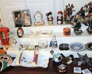 Collections from around the world - many Oriental.  Jade Trees, bells, masks and figurines.  Wedgewood and Goebel birds