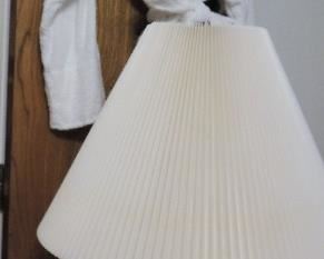 Selection of robes, silver lamp