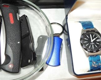 Pocket knives and watches and keychains