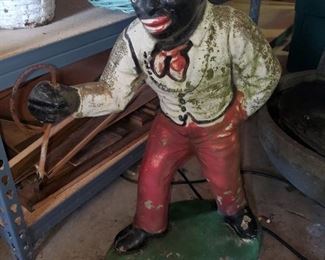 Vintage cement lawn jockey