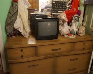 dresser with mirror, small tv, apron, decor