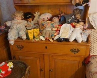 Cupboard with dolls