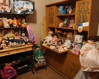 Dolls, china cabinet, baker's rack