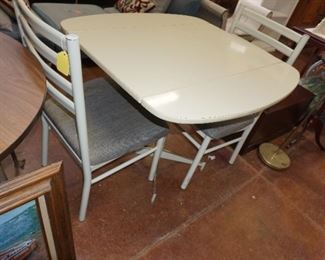 oblong table with two chairs