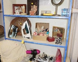 irons, hair care items, mirror, decor