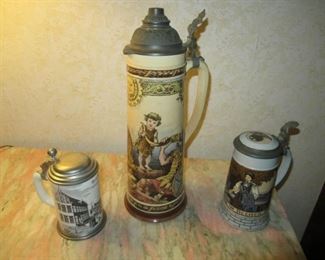 ANTIQUE/VINTAGE GERMAN BEER STEINS ALL MARKED OR STAMPED ONE IS A METTLACH AND IS 16" TALL