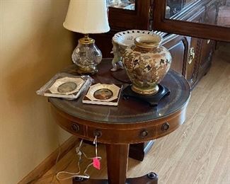 John A. Colby & sons round side table with drawers 