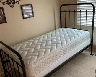 Twin size iron bed and twin size mattress and box springs 