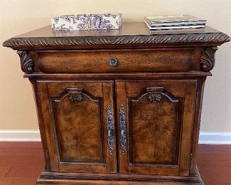 shallow drawer at top, 2 drawers behind cabinet doors