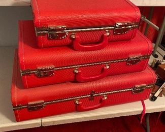 Pristine set of vintage luggage in this gorgeous cherry red color!