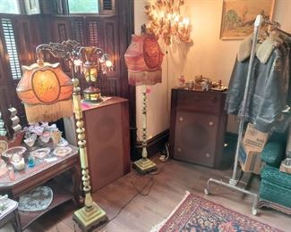 TALL WOOD CORNER SPEAKERS-NO NAME PLATES-AS IS WW11 AIR FORCE AS IS BOMBER COATS--1920 ORIGINAL VICTORIAN SILK SHADES ON GREEN JADEITE SLAG GLASS FLOOR LAMPS-BRASS FEATHER LIGHTED SCONCE