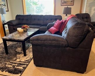 Never used Ashley furniture set - sleeper couch, loveseat, coffee table