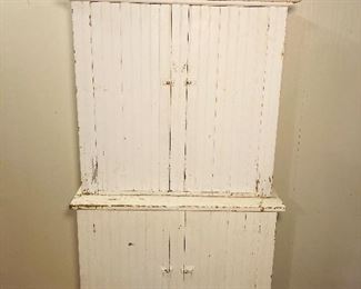 White stepback beadboard cupboard 