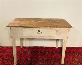 Grey work table with scrub top