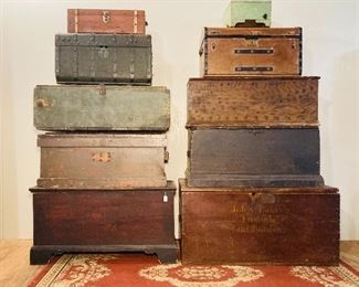 Variety of trunks: dated, smoke painted, stenciled, carpenters and travel