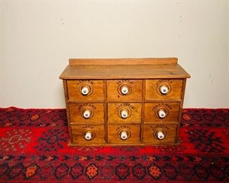 Spice cabinet with porcelain knobs