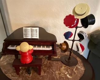 Teddy Takes Requests Musical - Put one of the six hats on his head and he will play tunes of the genre.