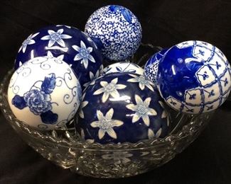 BLUE & WHITE GLASS BALLS IN A BOWL