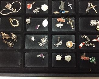 ASSORTED STERLING SILVER PINS & 3 MECHANICAL STERLING SILVER CHARMS