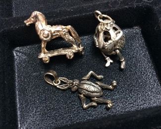 ASSORTED STERLING SILVER PINS & 3 MECHANICAL STERLING SILVER CHARMS