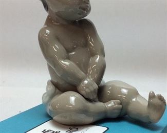 BOY WITH BOWLER HAT PORCELAIN FIGURINE