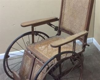 ANTIQUE WHEELCHAIR ADJUSTABLE LEGS