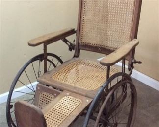 ANTIQUE WHEELCHAIR ADJUSTABLE LEGS