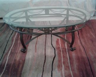 COFFEE TABLE WITH WROUGHT IRON BASE AND BEVELED GLASS TOP
