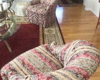 Pair of upholstered chairs with matching decorator pillows