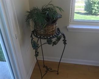One of a pair of iron plant stands