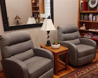 Two Swivel Rocker Recliners (about one year old)