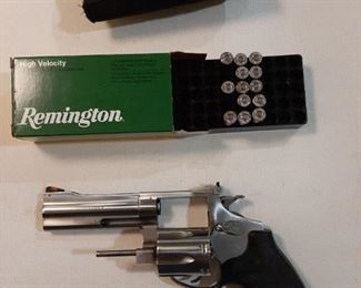 Rossi  357 Magnum Model 971 with Holster, some bullets, & case (not shown).  Gun will not be left on premises on off hours.