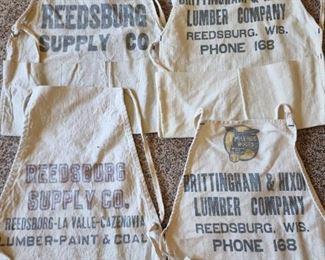 Reedsburg Supply Company and Brittingham & Hixon Reedsburg Lumber Aprons.