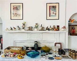 Eclectic collection of vintage collectibles Fromm all around the world .