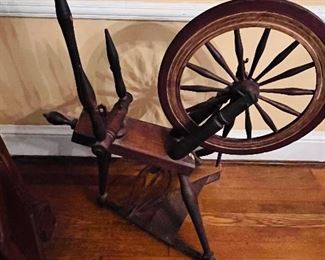 Antique spinning wheel.