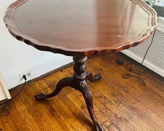 Pie crust  mahogany table.