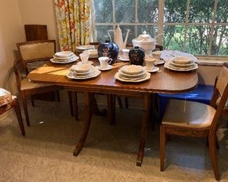 Mid Century dining table. 2 leaves and 7 chairs, Frankoma canisters