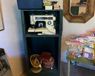 Sewing machine, sewing items and wooden shelves 