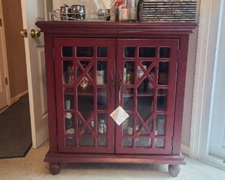 footed solid red/brown bar stand