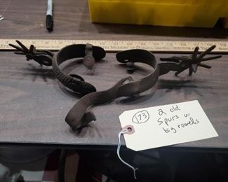 old cast iron spurs with large rowels
