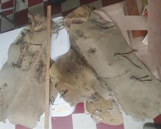 Old west cowboy leather chaps w conchos.  